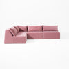 Modo 4-piece armless modular sectional sofa in faded rose pink performance fabric, studio photo