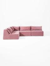 Modo 4-piece armless modular sectional sofa in faded rose pink performance fabric, studio photo