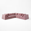 Modo 5-piece modular sectional sofa with corner seating in faded rose pink performance fabric, studio photo
