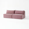 Modo armless (80") sofa in faded rose pink velvet, studio photo