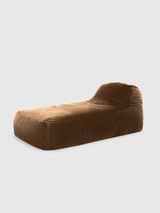 Brown divan lounger on a light gray background